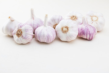 Image showing garlic bulbs on white background