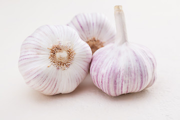 Image showing garlic bulbs on white background