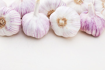 Image showing garlic bulbs on white background