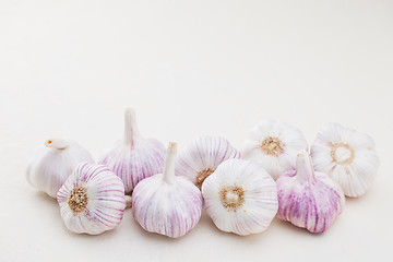 Image showing garlic bulbs on white background