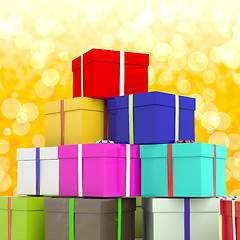 Image showing Multicolored Giftboxes  With Yellow Bokeh Background As Presents