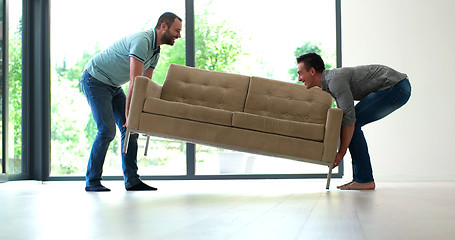 Image showing men carry the sofa