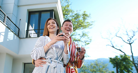 Image showing drinking coffee on terrace of villa in the morning