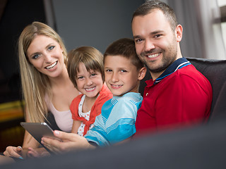 Image showing young cuple spending time with kids