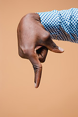 Image showing Black male hand point finger. Hand gestures - man pointing on virtual object with forefinger