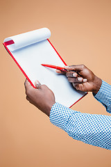 Image showing Male hand holding pen, isolated