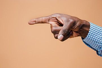 Image showing Black male hand point finger. Hand gestures - man pointing on virtual object