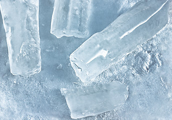 Image showing Refreshing Natural Background Of Icicles On Snow