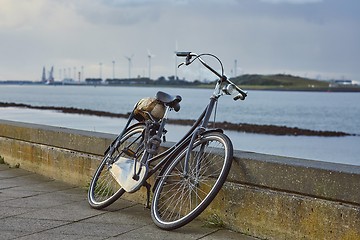 Image showing Bicycle on the road along the river