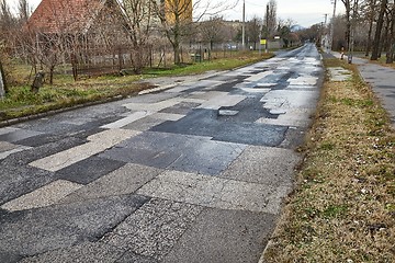 Image showing Patched broken road