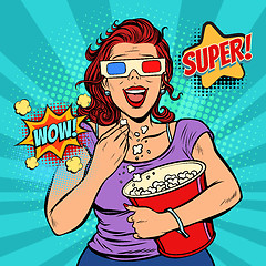 Image showing woman in 3D glasses watching a movie, smiling and eating popcorn