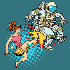 Image showing The woman kicks an astronaut family quarrel