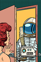 Image showing Astronaut came to visit a woman, the door was opened