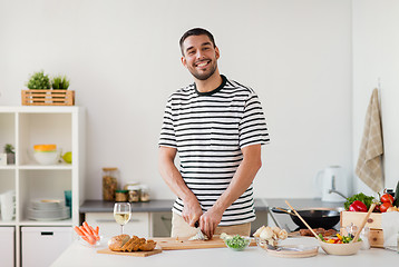 Image showing man cooking food at home kitchen