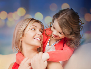 Image showing happy mother and daughter hugging