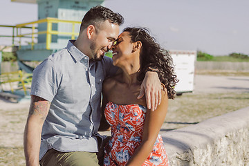 Image showing Happy multiracial couple on seafront