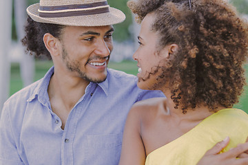 Image showing Cheerful couple looking at each other