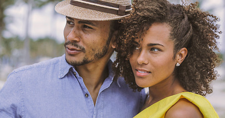 Image showing Ethnic couple looking away