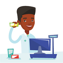 Image showing Pharmacist showing some medicine.