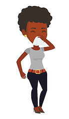 Image showing Young african-american sick woman sneezing.