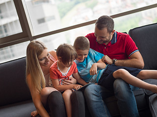 Image showing young cuple spending time with kids