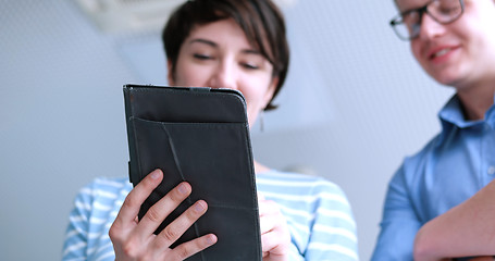 Image showing low angle shot of business people using technology