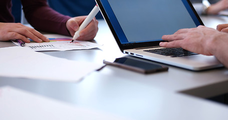 Image showing office and teamwork concept - group of business people having a 