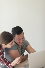 Image showing happy young couple buying online