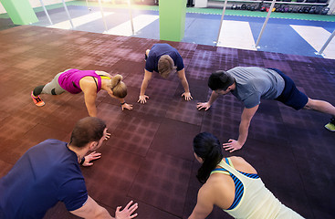 Image showing group of people exercising in gym