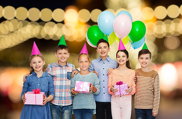 Image showing happy children with gifts at birthday party