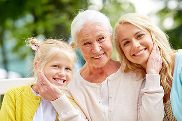 Image showing woman with daughter and senior mother at park