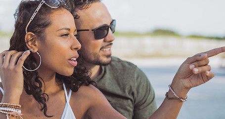 Image showing Stylish diverse couple chilling outside