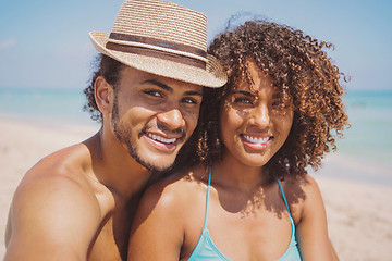 Image showing Couple looking at camera on beach
