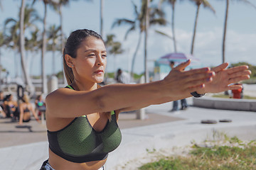 Image showing Woman bobbing with hands straight