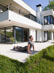 Image showing man doing morning yoga exercises