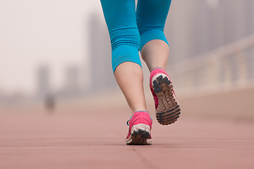 Image showing woman running on the promenade