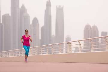 Image showing woman running on the promenade