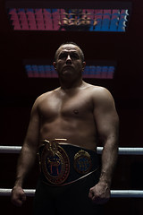 Image showing kick boxer with his championship belt