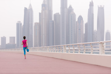 Image showing woman stretching and warming up