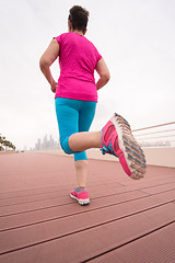 Image showing woman running on the promenade