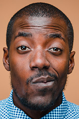 Image showing Positive thinking African-American man on brown background