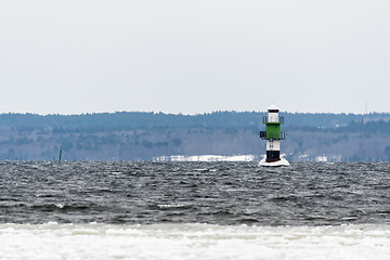 Image showing Beacon in an icy cold water