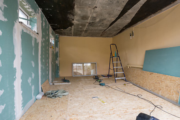 Image showing Repair in a private house, one wall is finished with plasterboard sheets