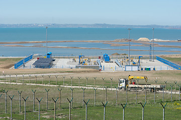 Image showing Taman, Russia - 15 April 2017: A platform with communications in front of the bridge that is being built across the Kerch Strait, from the tamani side, as of April 2017