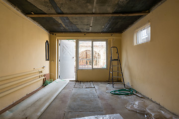 Image showing Repair in a private house, view of the entrance to the premises from the side of the street and the window