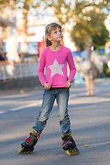 Image showing Six-year-old girl roller-skating