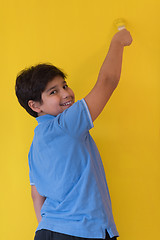 Image showing Portrait of a happy young boy painter