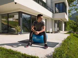 Image showing man doing morning yoga exercises