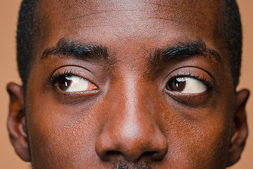 Image showing Positive thinking African-American man on brown background