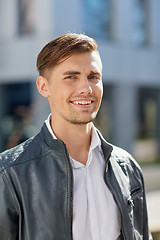 Image showing portrait of young man in leather jacket outdoors